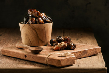 Dates are served on a wooden table