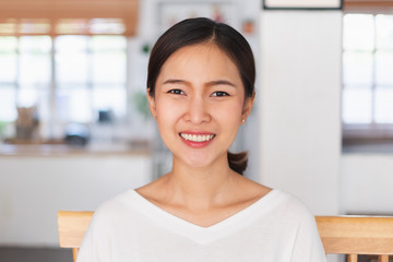 Portrait young Asian businesswoman work at home and virtual video conference meeting with...