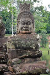 Obraz premium Angkor Thom, one of the ancient cities of the Khmer Empire in Cambodia. Statue of a demon (asura)