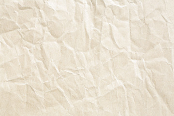 Old pale yellow crumpled paper background texture
