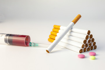 Cigarette, syringe, tablets, Bad habits, drug addiction