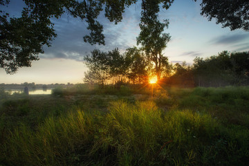 sunset on the quiet Kuban river, which originates from the Caucasus-Elbrus
