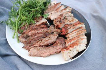 grilled pork , pork steak and beef steak