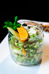 Fresh oatmeal and rice porridge with a beautiful serving and fruit. Bananas, berries, oranges and kiwi. Healthy and nutritious breakfast for children and adults. Different cereals
