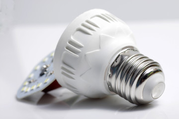 Close up shot of LED lamp with e27 type socket on an isolated white background