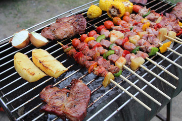 Barbeque Grill Street Food in thailand,Eat outdoors in a happy family.