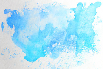Hand painted blue watercolor abstract stain on white paper. Paint splash background