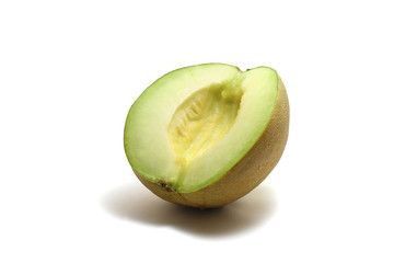A seedless sliced honeydew green melon (Cucumis melo) isolated on white background, perfect for breakfasting during ramadan