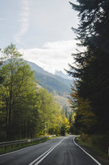 Autumn road with mountain view
