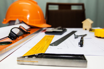 Fototapeta premium Engineer and Architect drawings blueprint at Construction Site