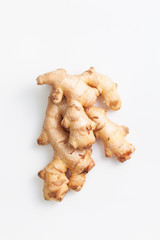 Young fresh ginger root on white background