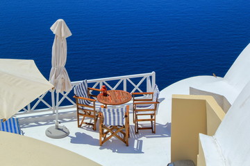 View from a balcony Oia village in the Caldera by day, Greece