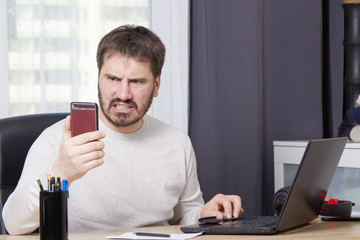 a man looking for work online unemployment concept