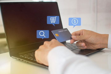 Online shopping with a notebook computer Pay for goods via credit card Convenient and fast