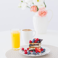 healthy dessert with different berries on white background