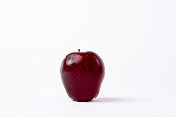 Portrait Of Red Apple Against White Background