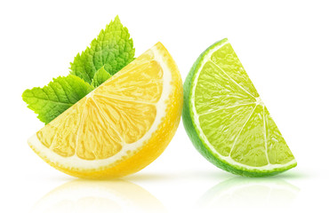 Isolated two citrus fruits slices. Pieces of lemon and lime with mint leaf isolated on white background