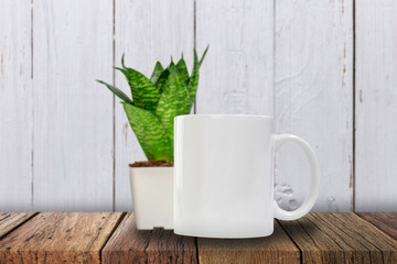 Blank ceramic white mug for mockup advertising concept