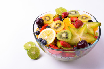 Portrait Of Assorted Delicious Fruits Against White Background