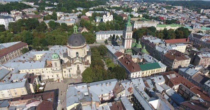 Aerial Roofs and streets Old City Lviv, Ukraine. Central part of old city. European City in spring. Densely populated areas of the city. Panorama of the ancient town. Ukraine Dominican. Drone shot