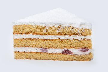  A slice of cake with cherries and white cream isolated on a white background. 