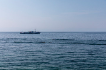 Lake Baikal, cruise ship rides tourists on a Sunny day