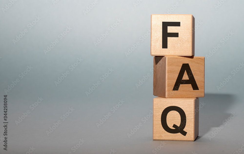 Poster faq text on cube blocks on grey blue background with copy space available