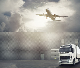 White truck in the forecourt of an interchange port ready to load the goods and reach the...