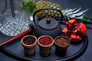 Close-up view of Eastern hookah tobacco of different flavors. Shisha concept. Modern hookah.