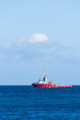 Ship in blue ocean