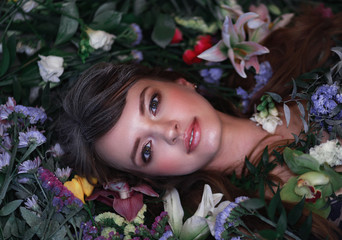 Fototapeta premium beautiful girl with flowers spring mood