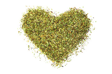 Heart shape from provence herbs on a white isolated background. Flat lay. Dried herbs, seasonings.