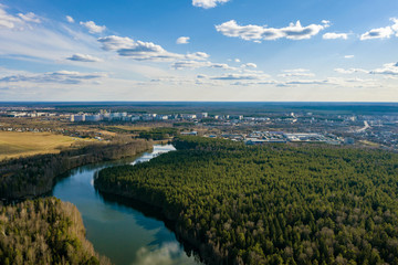 A panorama of the city of Ivanovo with the Kharinka River from a bird's eye view.