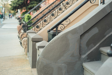 Brownstone Houses lined up stairways during golden hour for real estate commercial photography brokers new york new jersey area