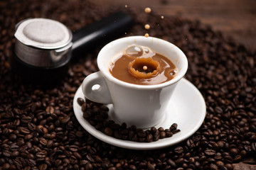 Drops of coffee splashing in a coffe milk, high speed
