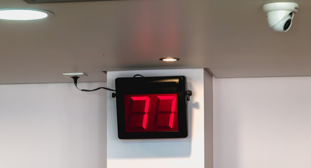 led panel indicating the turns of the customer 77