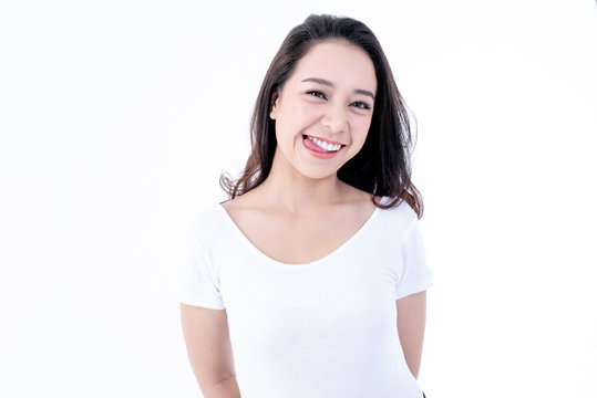 Portrait images of Asian young, pretty woman, She is smiling brightly, She has beautiful white and clean teeth, sparking eyes On white background to people and beauty concept.