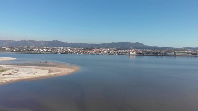 DRONE FOOTAGE - Northern Litoral Natural Park, Ofir, Esposende, Portugal. The marginal riverside, along the mouth of the Cavado River.