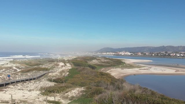 Northern Litoral Natural Park in Ofir, Fao, Esposende, Portugal. The two sides of Restinga de Ofir. One facing the ocean, the other the estuary of C&aacute;vado River.