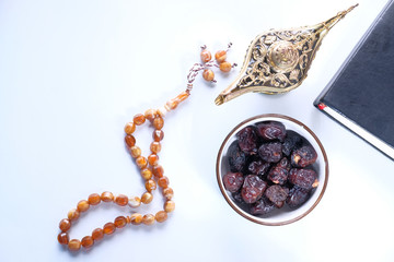 the concept of ramadan, close up of date fruit in a bowl