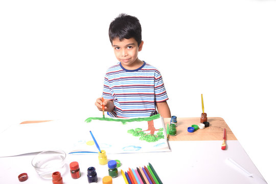 Little kid drawing and painting