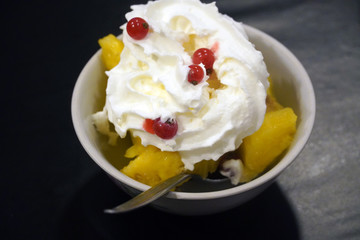Pineapple with whipped cream and Silver buffaloberries