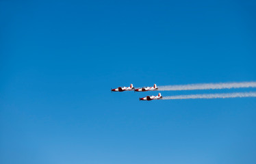 Air Acrobatic flight reciprocating aircraft Israeli group showing flying skills on the Parade of Independence Day of Israel