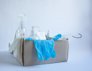 open mail box with antibacterials, medical masks and paper towels, latex gloves, side view