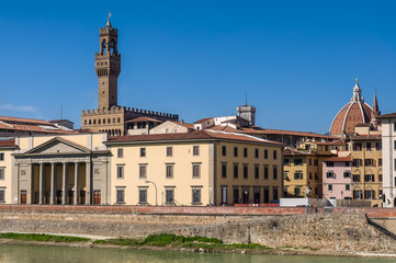 Florence Chamber of Commerce (Camera di Commercio di Firenze) and tower of Old Palace (Palazzo Vecchio). Florence, Tuscany, Italy. - 344268452