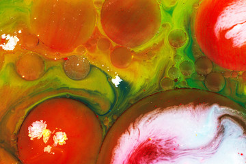 Mixture of natural colors. Bright colored background of watercolors and oil paints. Multi-color...