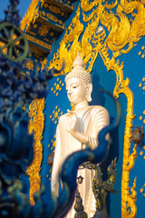 Fototapeta premium A beautiful view of Wat Rong Suea Ten, the Blue Temple at Chiang Rai, Thailand.