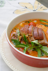 Kaeng Pled Ped Yang (Roasted Duck in Red Curry with tomato,pineapple,Lychee prepared in coconut milk).