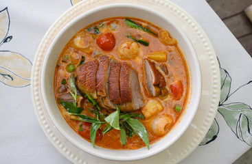 Kaeng Pled Ped Yang (Roasted Duck in Red Curry with tomato,pineapple,Lychee prepared in coconut milk).