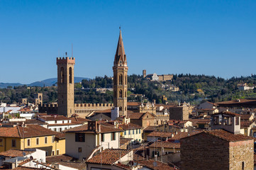 Fototapeta na wymiar Museum Palazzo del Bargello and church Badia Fiorentina. Aerial view from Giotto's Campanile. Florence, Tuscany, Italy.